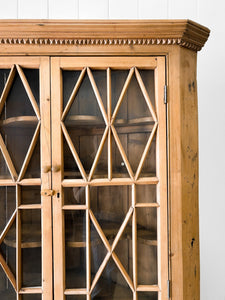An English 19th Century Pine Corner Cupboard with Astragal Glazed Doors
