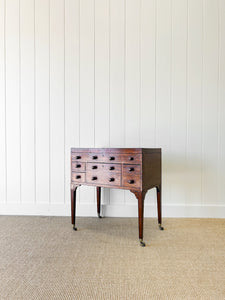 An Antique English Server or Bachelors Chest with 7 Drawers
