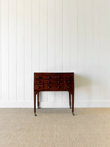 An Antique English Server or Bachelors Chest with 7 Drawers