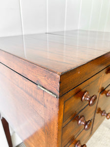 An Antique English Server or Bachelors Chest with 7 Drawers