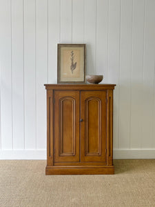 A Handsome English 19th Century Faux Painted Pine Cupboard