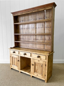 A Rustic Pine Welsh Dresser or Cupboard c1890 With Dog Kennel Center