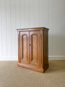 A Handsome English 19th Century Faux Painted Pine Cupboard