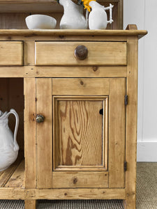 A Rustic Pine Welsh Dresser or Cupboard c1890 With Dog Kennel Center