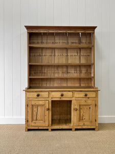 A Rustic Pine Welsh Dresser or Cupboard c1890 With Dog Kennel Center