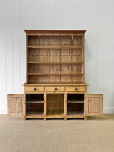 A Rustic Pine Welsh Dresser or Cupboard c1890 With Dog Kennel Center
