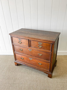 An Early 19th Century English Country Oak Chest of Drawers Dresser