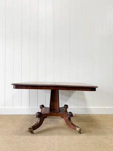 An English Mahogany Breakfast Table with Castors