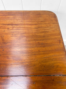 An English Mahogany Breakfast Table with Castors