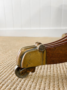 An English Mahogany Breakfast Table with Castors
