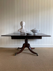 An English Mahogany Drop Leaf Pedestal Breakfast Table c1820