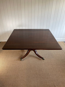 An English Mahogany Drop Leaf Pedestal Breakfast Table c1820