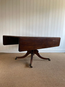 An English Mahogany Drop Leaf Pedestal Breakfast Table c1820